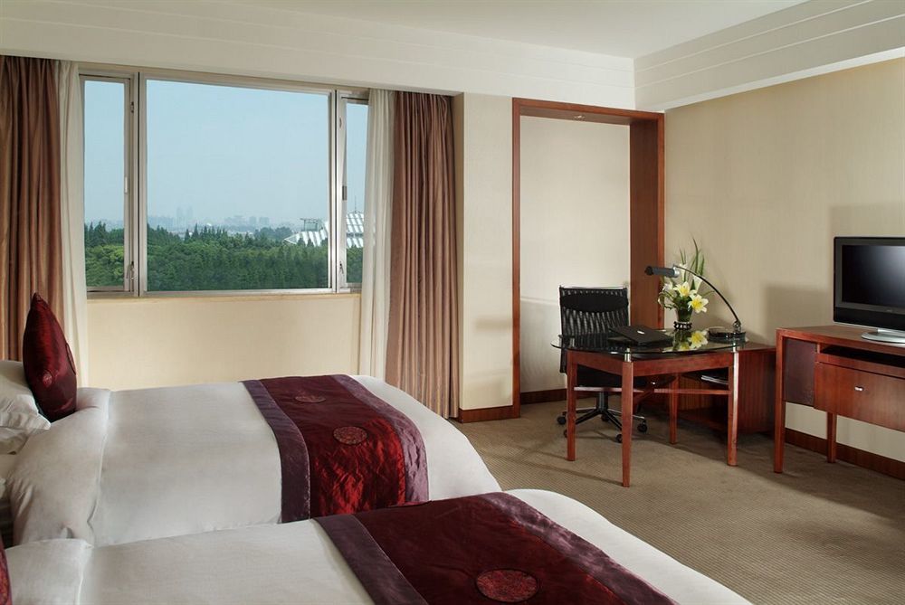 فندق شانغهايفي  فندق جراند سكايليت جاردنز الغرفة الصورة